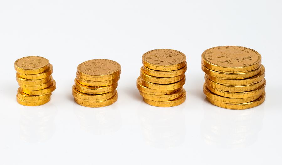 Tumpukan koin emas sebagai ilustrasi bonus anggota baru